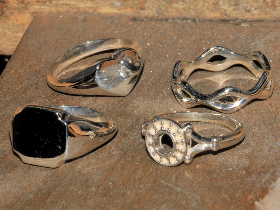 Sterling silver jewelry with intricate features, designed and produced by Artforge using investment casting patterns 3D printed on the 3D Systems FabPro 1000 