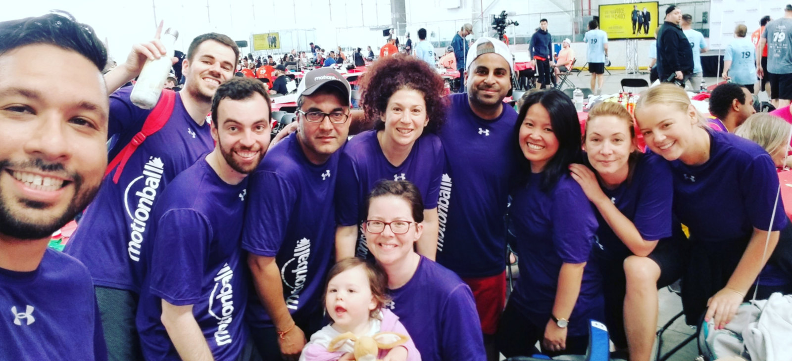 Q4 Inc. Employees in the Patio.